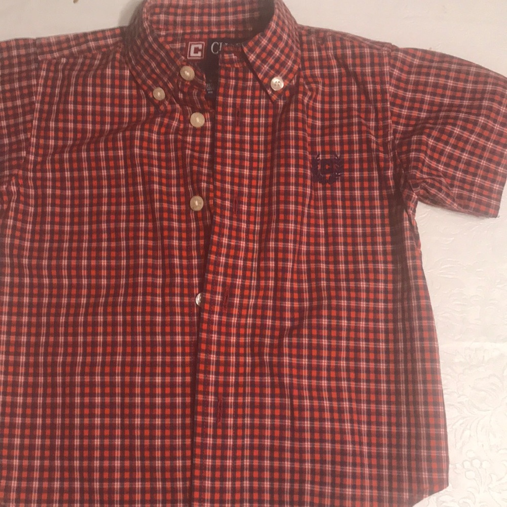 Plaid button down shirt.